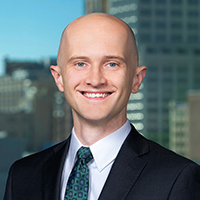 Justin Lollman commercial litigation, white collar criminal defense, corporate investigations, false claims act, insurance law, appellate attorney, Oklahoma